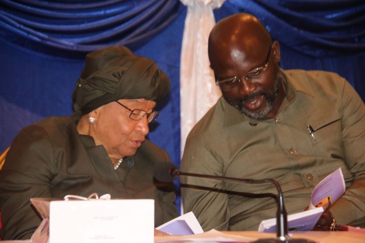 President Sirleaf and President-Elect George Weah compare notes during Legacy Project